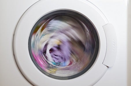 Clothes spinning around in a washing machine