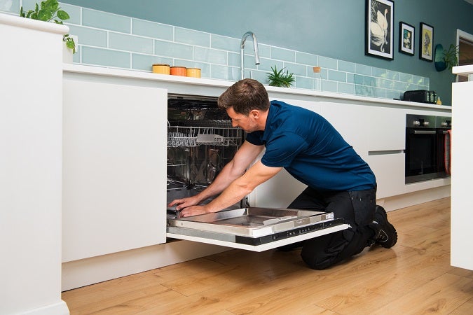 Domestic and General engineer repairing a dishwasher